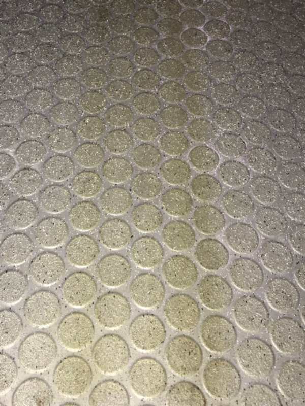 Staining caused by an ambulance gurney wheels